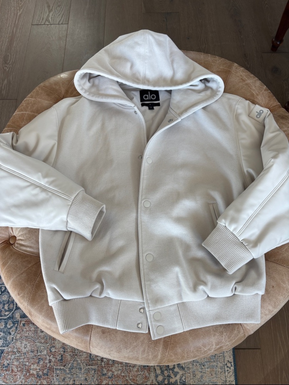 ALO Yoga Men's Hooded Bomber Jacket in Bone Size S